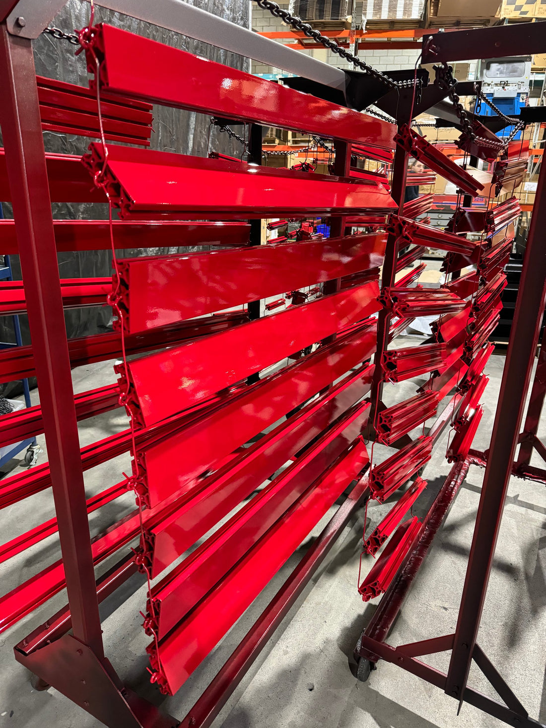 Red extrusions on racks