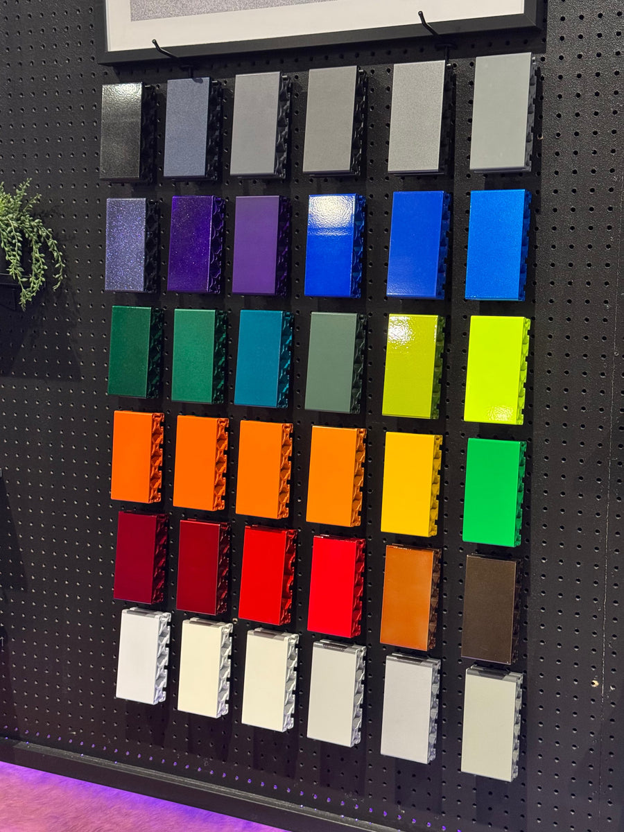 Lit wall of powder coating colour samples